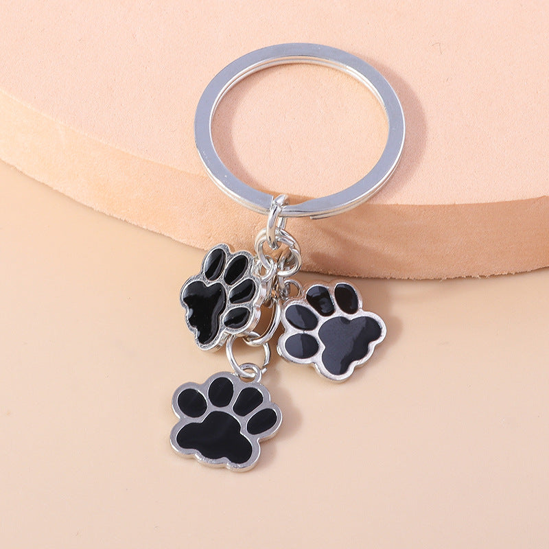 Wholesale Cartoon Cute Three Dogs Paw Print Keychain